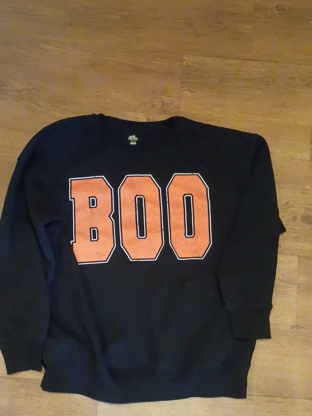Black Unisex Crewneck Sweatshirt with Orange 'BOO' Graphic